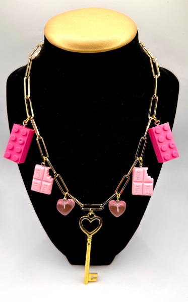 Pink charm necklace